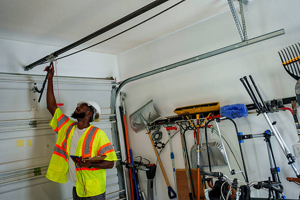 Professional Garage Door Panel Replacement technician working in Piqua, OH